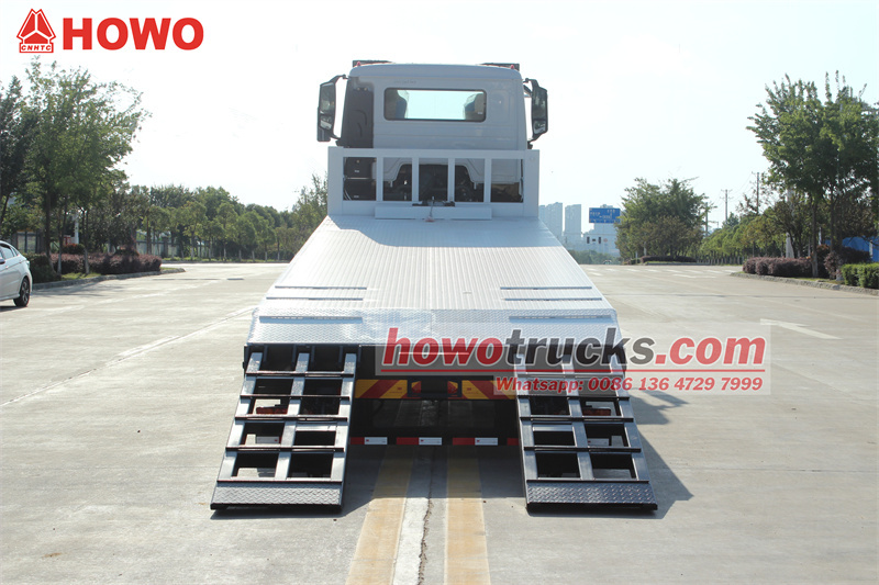 HOWO NX 6x4 self loader flatbed transport truck